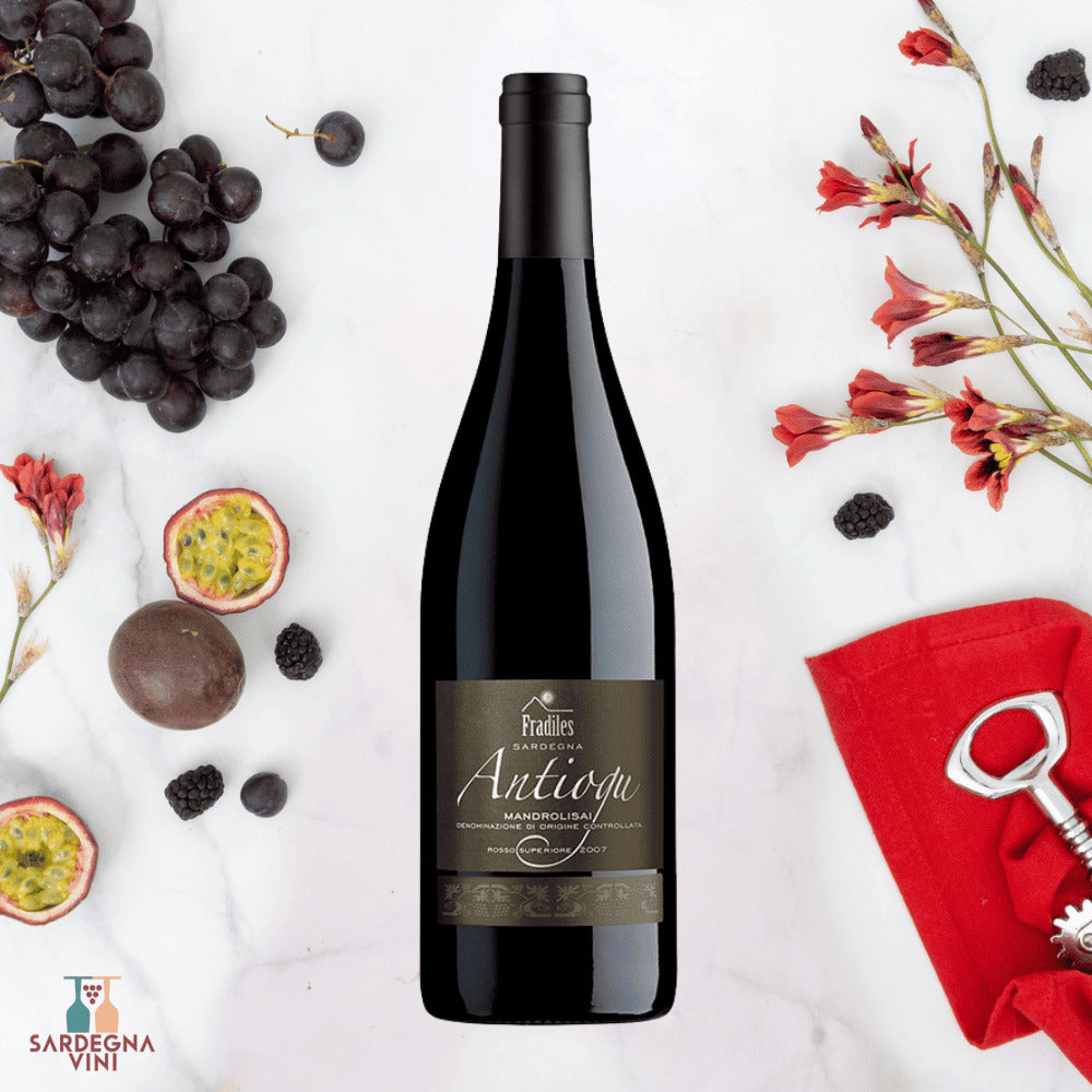 A bottle of Cantina Fradiles Antiogu Mandrolisai Superiore DOC 2022 red wine with a rich, deep crimson color.