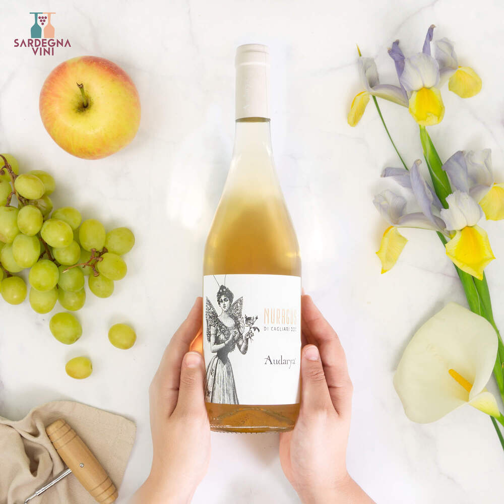 Bottle of Audarya Nuragus di Cagliari 2024 Vino Bianco with a label showcasing elegant design and pale yellow liquid.