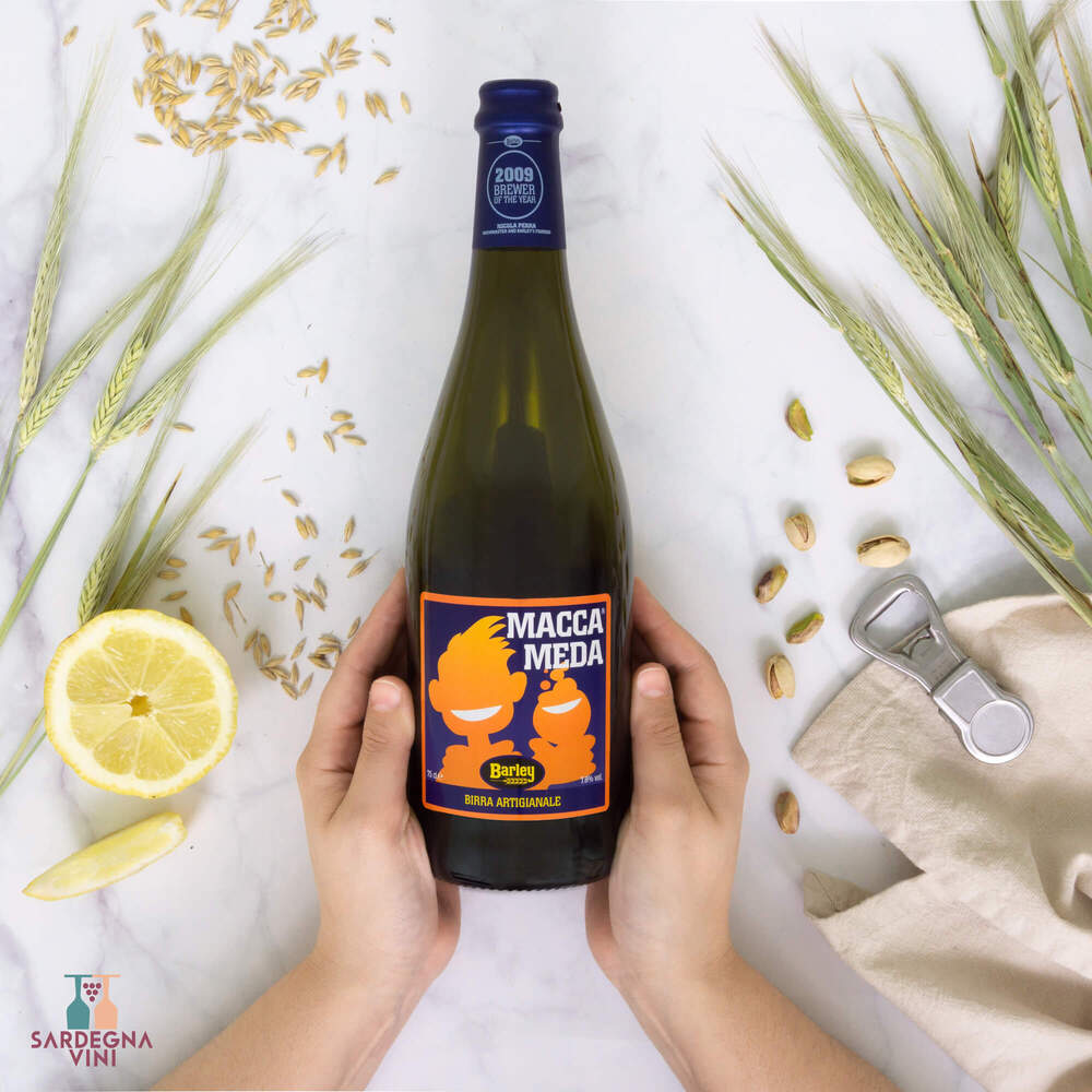 American Amber Ale by Birrificio Barley in a glass, showcasing rich amber color and frothy head.