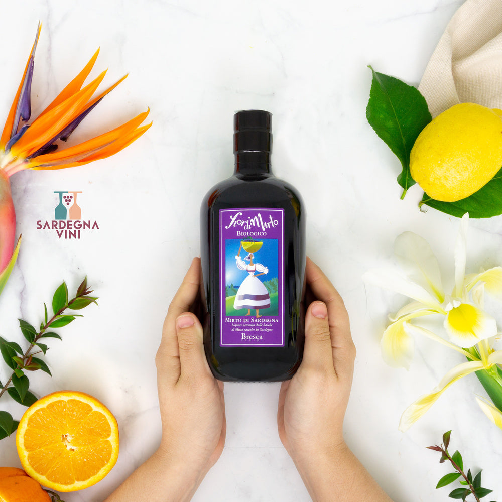 Bottle of Fiori di Mirto Bio liquore by Bresca Dorada with a green label and elegant design, showcasing its herbal essence.