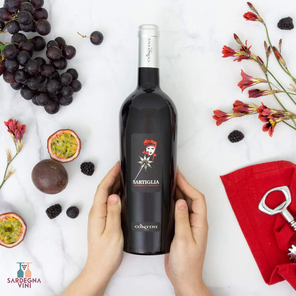Bottle of Cantina Contini Sartiglia Cannonau di Sardegna DOC red wine with a deep ruby color and elegant label design.