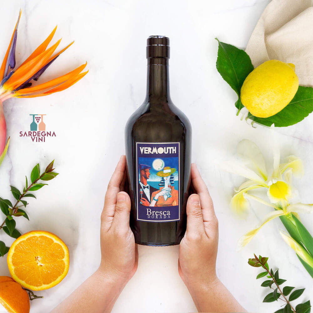 Bottle of Vermouth Bresca Dorada showcasing its rich amber color and elegant label design.